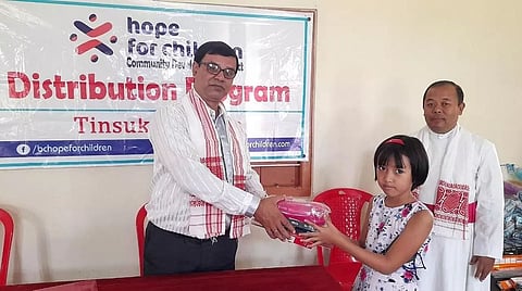 Study materials distributed to school students in Doomdooma