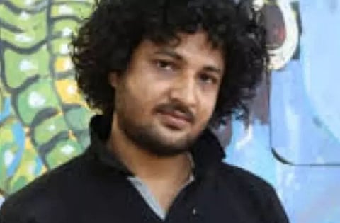 Painting of anti-dam graffiti on 'Wall of Harmony' in Itanagar