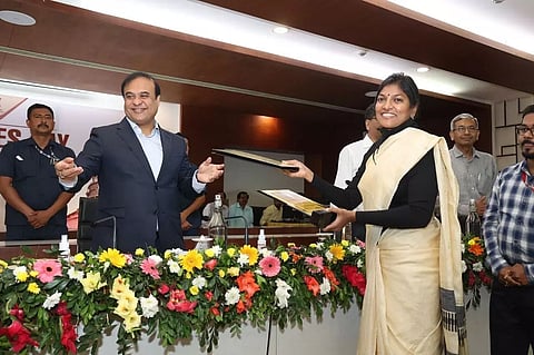 CM Himanta Biswa Sarma hands over Karmashree Award to Cachar DC Keerthi Jalli