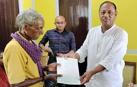Forest Minister Parimal Suklabaidya hands over cheques to poor patients