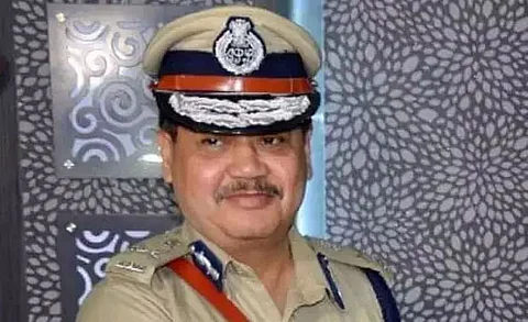 DGP Bhaskar Jyoti Mahanta rides bike to celebrate award in Dhubri district