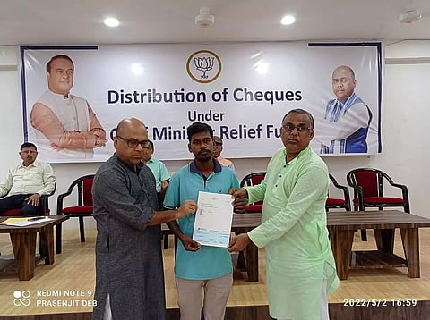 Cheques handed over to beneficiaries under CM's relief fund in Silchar