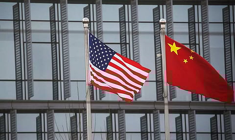 Chinese firms rush to Singapore, HK bourses amid US delisting threat