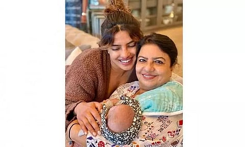 Priyanka shares glimpse of daughter Malti cradled in mother Madhu's arms