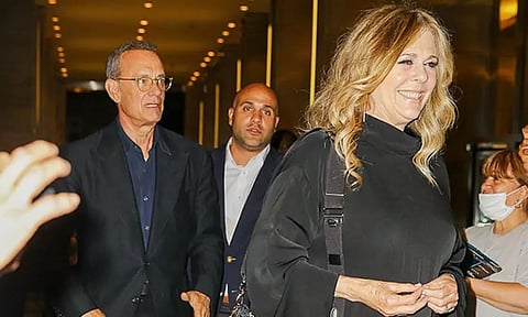 Tom Hanks yells at fans after they cause wife Rita to trip