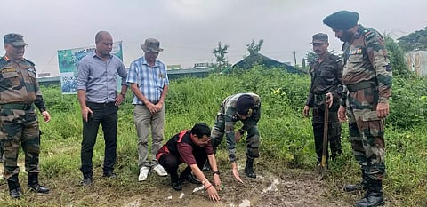 East Siang district DC Tayi Taggu plants sapling under Army's green drive