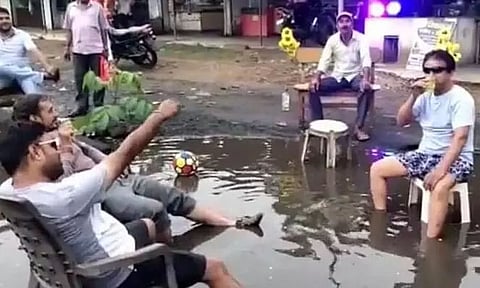 What an idea! Madhya Pradesh residents throw party on pothole-filled road
