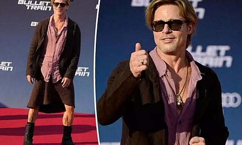 Brad Pitt flaunts his rarely seen leg tattoos, dons a skirt