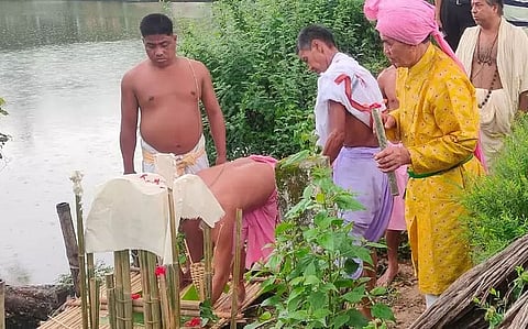During Tripura's centuries-old Ker Puja, families pay a fine for births, deaths