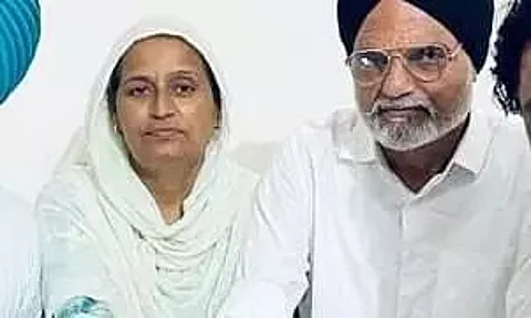 Sidhu Moosewala's parents get son's face tattooed on their arms