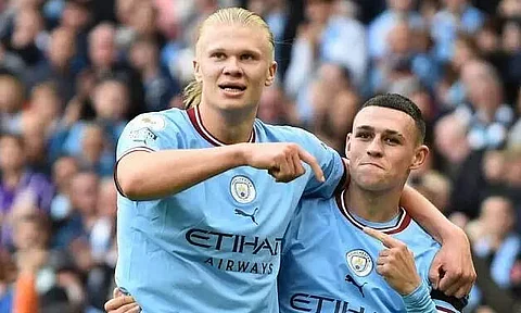 Erling Haaland and Phil Foden hat-tricks as City thrash United in English Premier League
