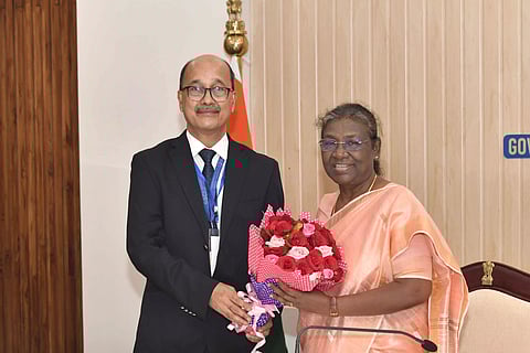 BBCI Director Presents his Autobiography to Indian President