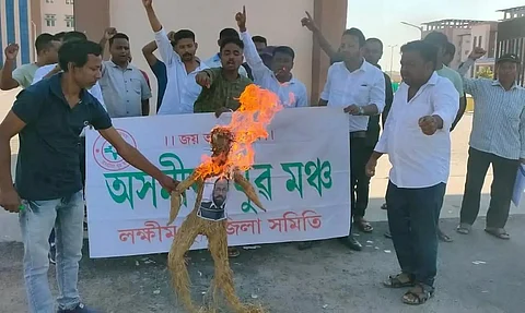 Collection of parking fees in Lakhimpur Medical College and Hospital (LMCH): AYM burns effigies of Health Minister, LMCH Principal