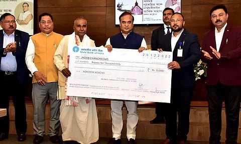 CM Himanta Biswa Sarma distributes fiscal aid to naamgharias, priests