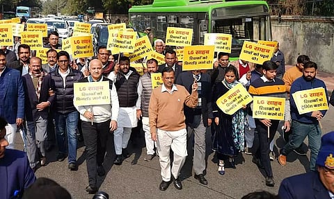 Aam Aadmi Party (AAP) MLAs march towards L-G's office
