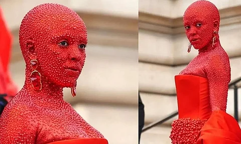 American rapper Doja Cat covered in red paint & 30,000 crystals for Paris Fashion Week