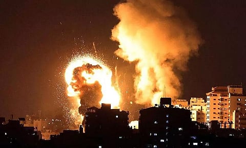 Israel strikes Gaza in response to Palestinian rocket fire as the US urges calm