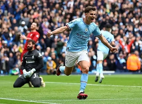 Premier League: Manchester City defeat Liverpool to keep pressure on Arsenal