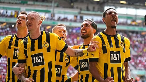 Haller double guides Dortmund closer to first league title in 11 years