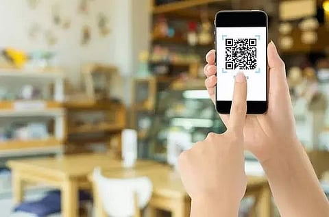 Philippine authorities warn of syndicate crime behind child beggars using QR code