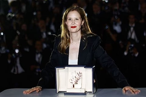 Palm d’Or winner stirs a row after she slams French government