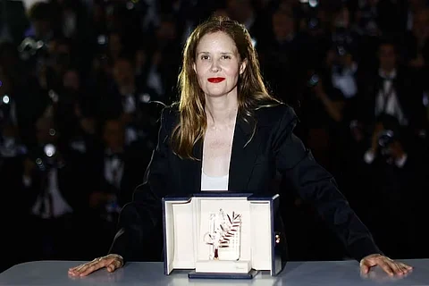 Palm d’Or winner stirs a row after she slams French government