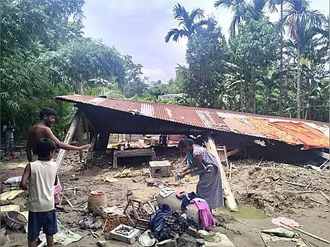Local people in Bajali district take shelter on embankments