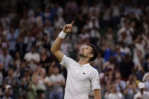 Novak Djokovic survives Stan Wawrinka’s late surge