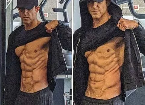 Hrithik Roshan flaunts abs in latest pictures