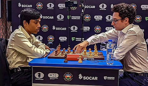 GM R Praggnanandhaa holds Carlsen of the FIDE World Cup chess tournament