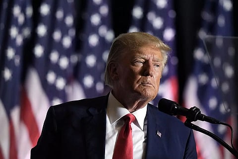 Trump’s mug shot puts brake on his poll prospects