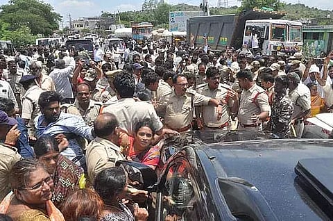 Supporters try to block police vehicle carrying Chandrababu Naidu