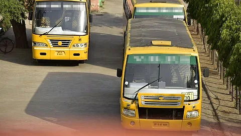 Dima Hasao Autonomous Council Chief Executive Member Debolal Gorlosa distributes school buses