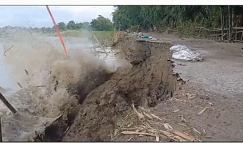 Sampora river engulfs part of Ghilamora-Bilmukh PWD road in Lakhimpur district