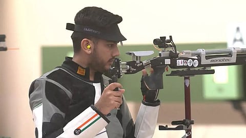 Men shooters hit the mark with gold and two bronze medals in 10m rifle team sets world record