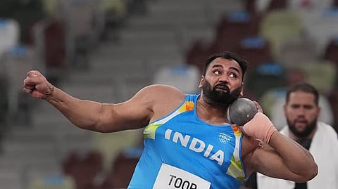 Toor defends shot put title with an amazing final throw