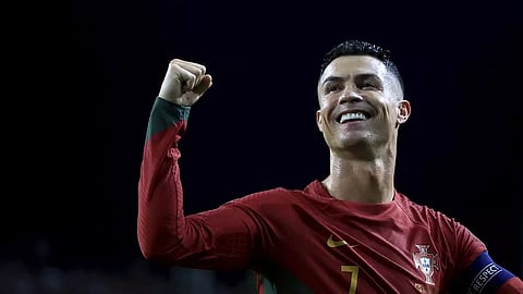 Ronaldo scores twice as Portugal qualify thriller against Slovakia in Port