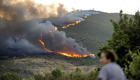 Wildfire burns in Spain; more than 900 people evacuated