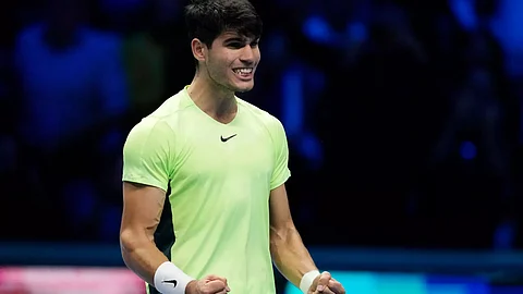ATP Finals: Carlos Alcaraz beats troubled Andrey Rublev to keep hopes alive