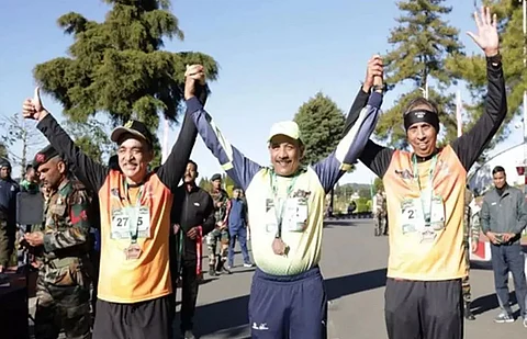 Three NDA coursemates of batch 67 script history at Hill Half Marathon, Shillong