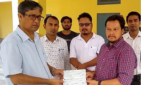 Educationist couple Dr. Khagendra Kumar Nath and wife donate Rs 2 lakh to CM's Relief Fund