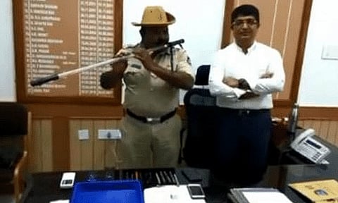 Karnataka Cop Turns 'Lathi' Into Flute To Play Folk Songs