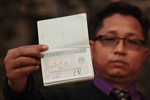 'Take up stapled visa with Xi'