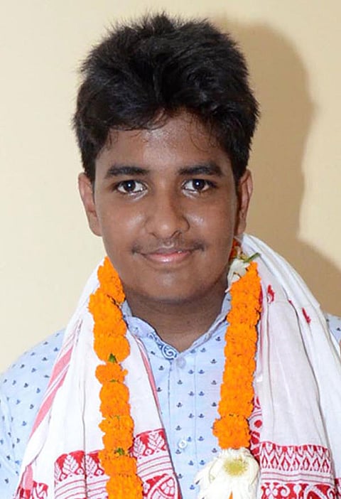 Rounak Luhia Commerce topper