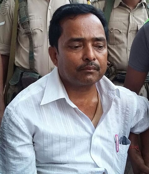 NRC official caught taking bride