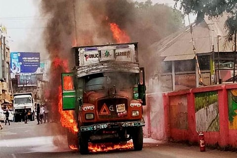 One killed in road mishap, irate mob set truck on fire