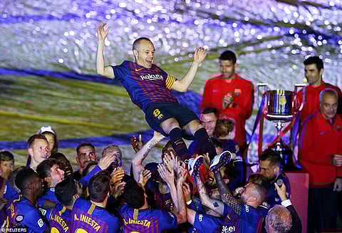 Iniesta ends Barca career with win