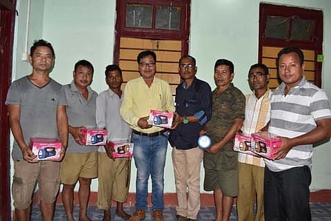Nature lover distributes flashlights among villagers, forest guards
