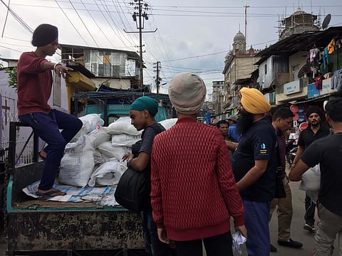 Bangalore Sikh body distributing food among Sweepers’ Lane residents