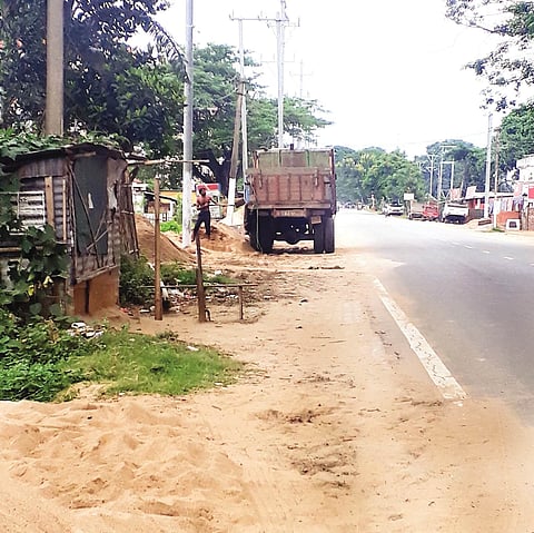 Sand business on road